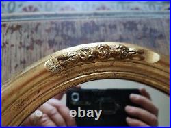 Ancien miroir avec cadre ovale art nouveau décor de rose bois doré