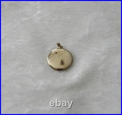 Ancien pendentif porte photo Art Nouveau plaqué or toile d'araignée et pierre