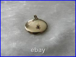 Ancien pendentif porte photo Art Nouveau plaqué or toile d'araignée et pierre