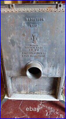 Ancien poêle radiateur gaz fonte émaillée verte 1900 art nouveau