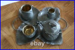 Ancien service en ETAIN ART NOUVEAU fumeur tabac DECOR NENUPHAR signé E. FRERES Ancien service en ETAIN ART NOUVEAU fumeur tabac DECOR NENUPHAR signé E. FRERES