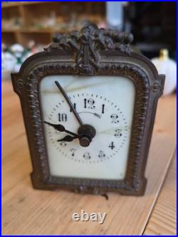 Ancienne pendulette de voyage Art Nouveau en bronze et onyx vers 1900