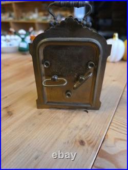 Ancienne pendulette de voyage Art Nouveau en bronze et onyx vers 1900