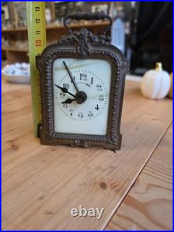 Ancienne pendulette de voyage Art Nouveau en bronze et onyx vers 1900